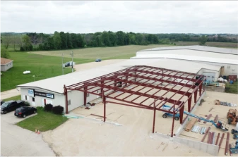 Photo marking LMI ownership change in 2018