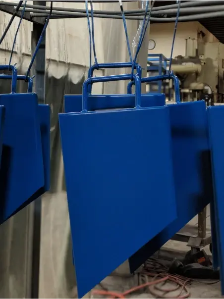 Powder coating and finishing on manufactured metal part