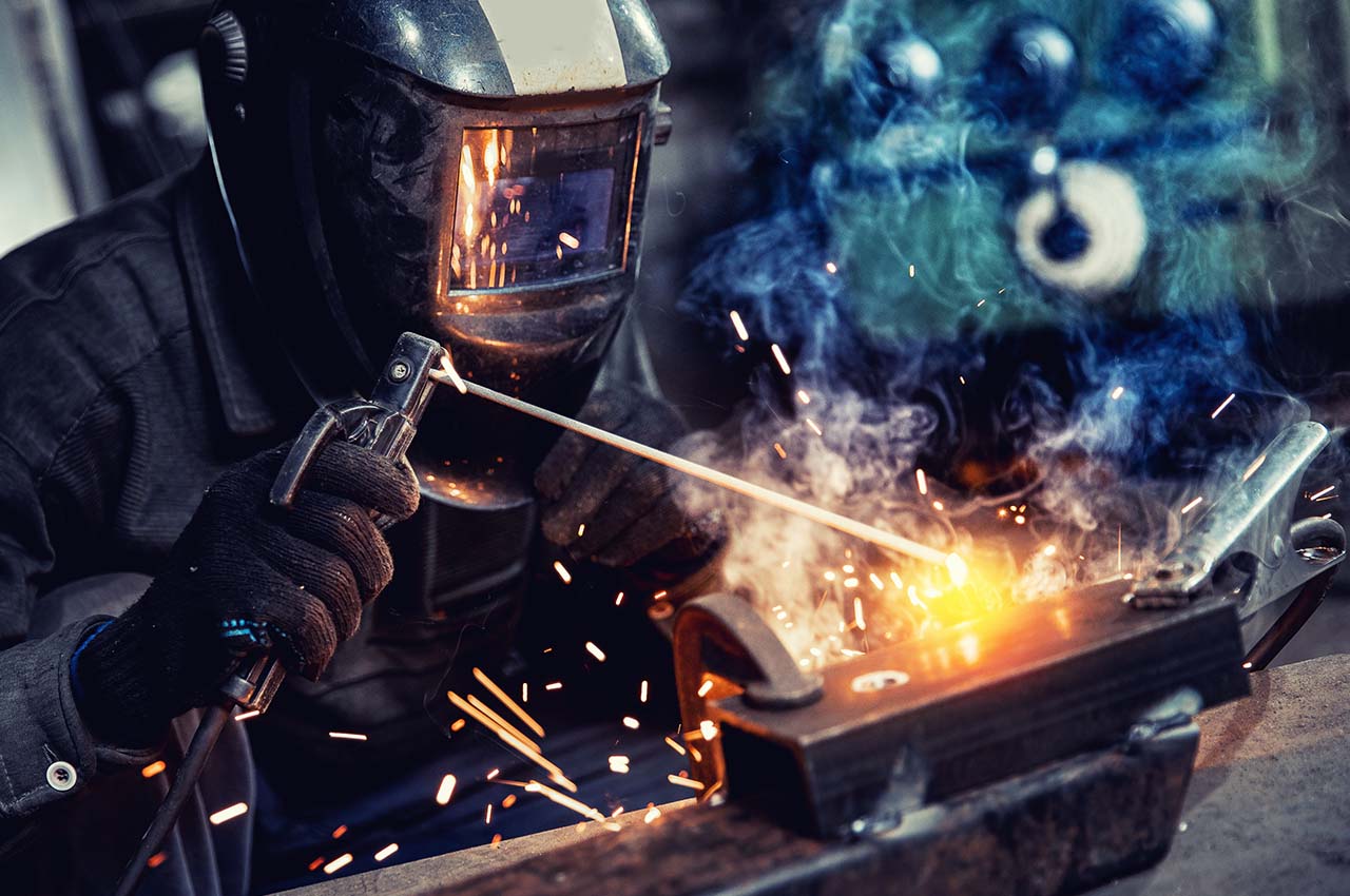 person welding